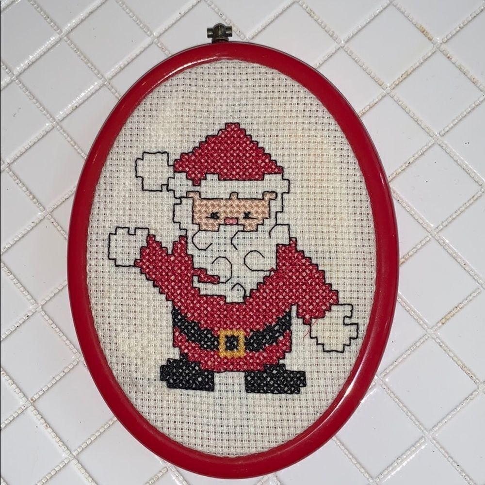Santa cross stitch picture in red frame‎
